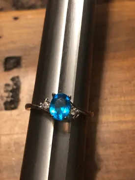 Costume Ring with Blue Stone; A Brand New Aura, A Brand New You